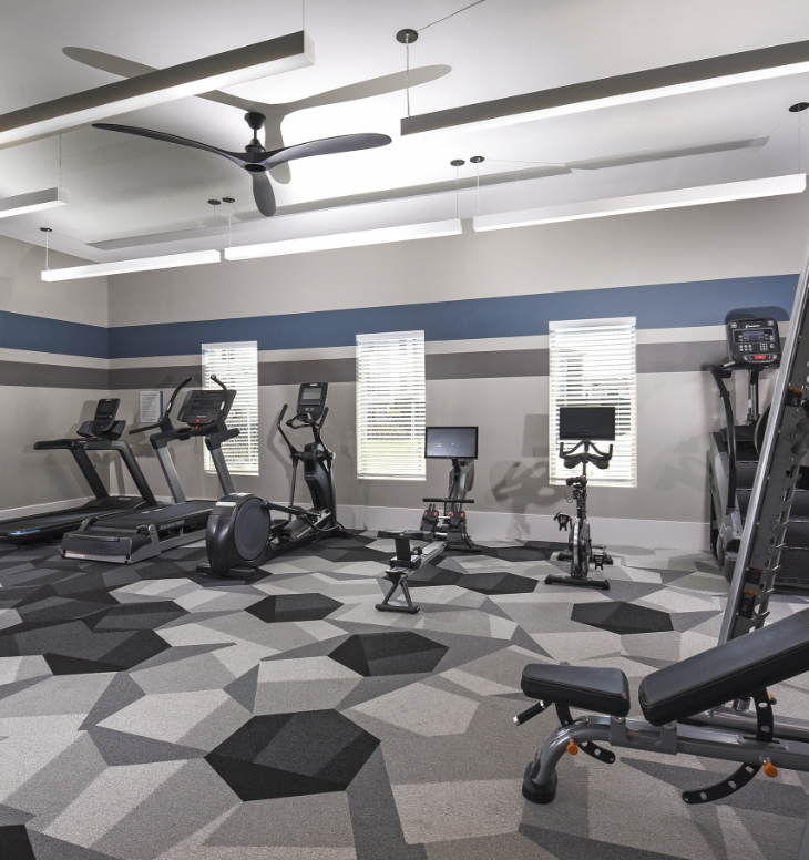 Spacious fitness center with cardio equipment at our apartments off 290.